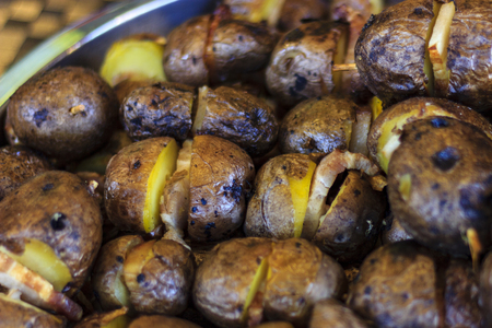 shish kebab from potatoes and slices of fatの写真素材