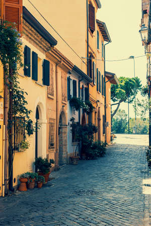 Ancient houses on the picturesque Via Marecchia in Borgo San Giuliano, Rimini, Italy.の写真素材