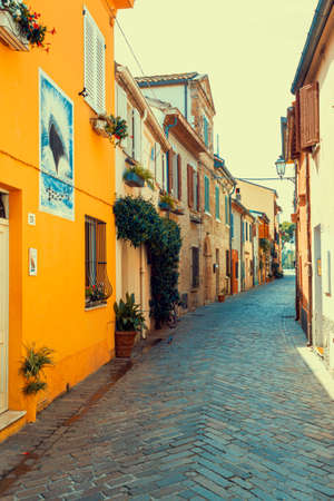 Ancient houses on the picturesque Via Marecchia in Borgo San Giuliano, Rimini, Italy.の写真素材