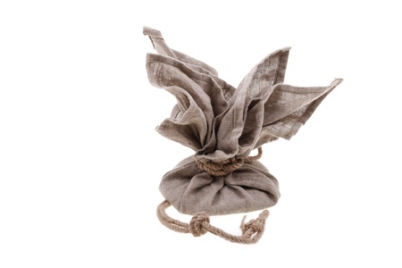 Big linen bag full of money tied by rope  Money and savings concept on white background の写真素材