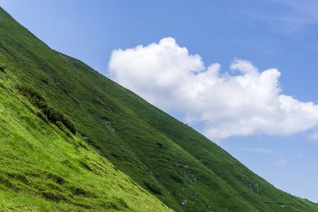 Mountain ridge against the blue sky. Western Tatras. Poland.の写真素材