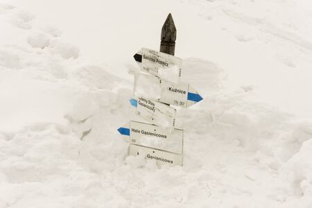Sign of the trails in the mountains in deep snow. Tatra Mountains. Poland.の写真素材