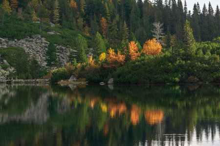 Popradske Pleso beautiful mountain lake in Slovakia in autumn.の写真素材