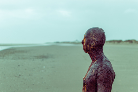 ENGLAND, LIVERPOOL - 15 NOV 2015: Iron man, Crosby Beachのeditorial素材