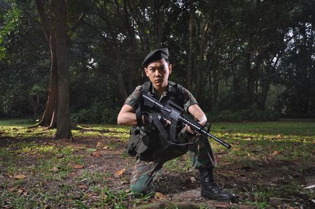 Smart Asian Soldier In The Forest の写真素材