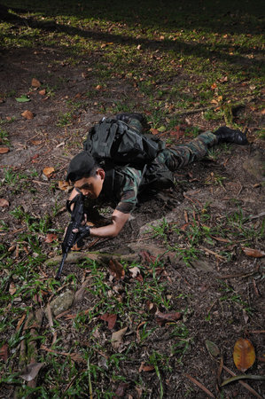 Smart Asian Soldier In The Forest 