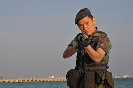 Smart Asian Man In Soldier Uniformの写真素材