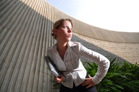 Caucasian Woman In Smart Casual doing a fashion pose
