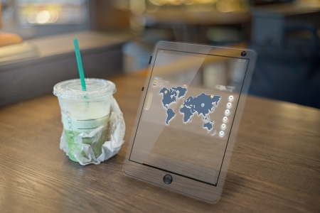 Picture of a futuristic tablet on a table in a coffee chainの写真素材