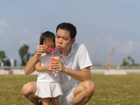 outdoor bonding between father and daughterの写真素材