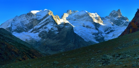 The autumn night in Caucasus mountainsの写真素材