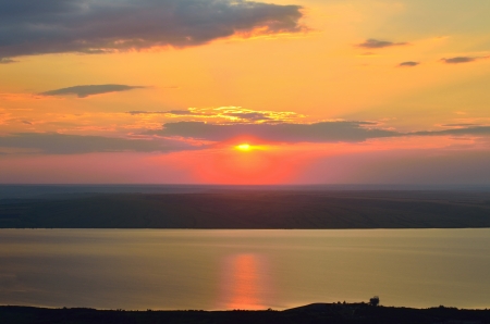 This is colorful sunset over Caucasus lakeの写真素材