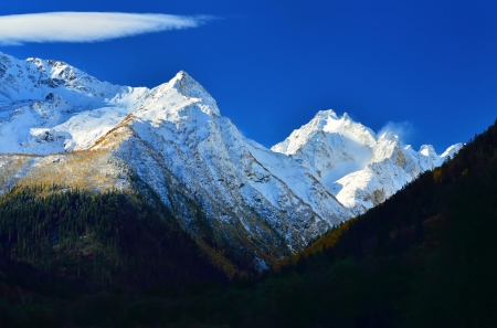 This is colorful dawn in Caucasus mountains in fallの写真素材
