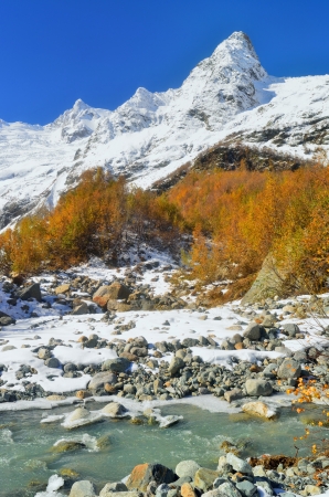 This is sunny day in Caucasus mountains in autumnの写真素材