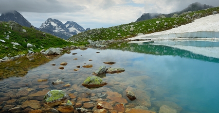This is colorful lake in Caucasus mountains is summerの写真素材