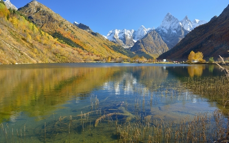 This is colorful lake in Caucasus mountains in fallの写真素材