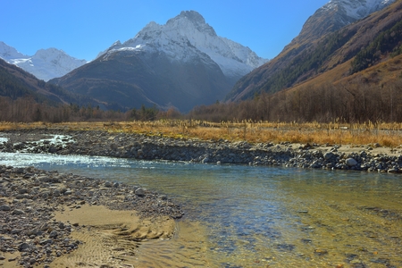 This is sunny landscape in Caucasus mountains in fallの写真素材