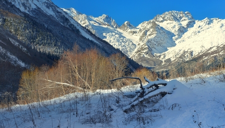 This is sunny landscape in Caucasus mountains in beginning winterの写真素材