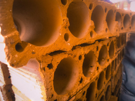 Orange bricks to build, stacked, construction.