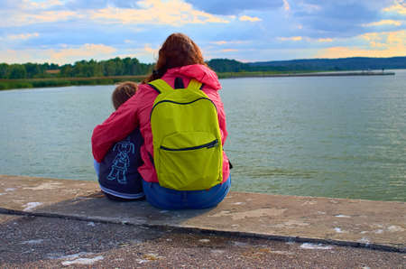Mother embracing her daughterの写真素材