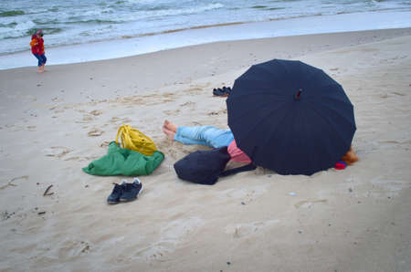 On the beach during bad weatherの写真素材
