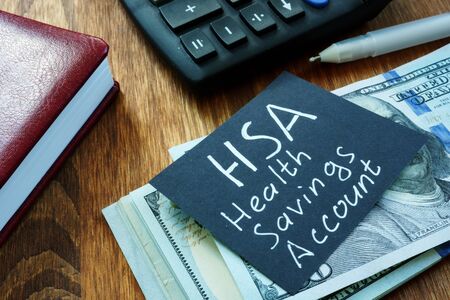 Writing note shows the text HSA Health savings accountの写真素材