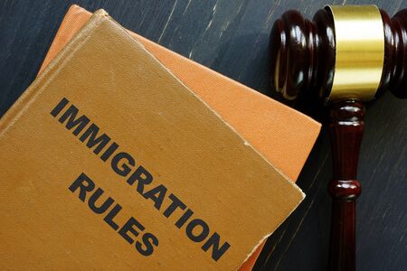 Business photo shows printed text immigration rulesの写真素材