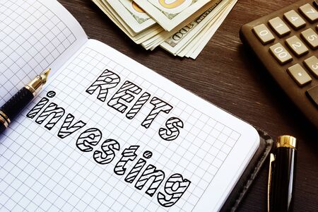 Real estate investment trusts REITs investing is shown on the business photoの写真素材