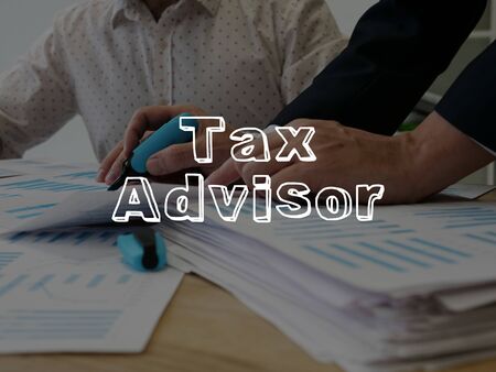 Tax Advisor is shown on the conceptual business photoの写真素材