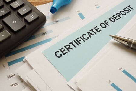 certificate of deposit CD is shown on the conceptual business photoの写真素材