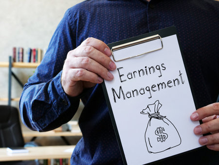 Earnings Management is shown on the conceptual business photo