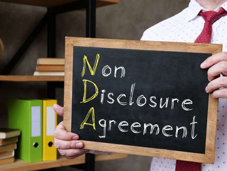 Non-Disclosure Agreement NDA is shown on the conceptual business photoの写真素材