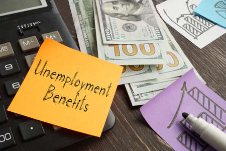 Unemployment Benefits are shown on the business photoの写真素材