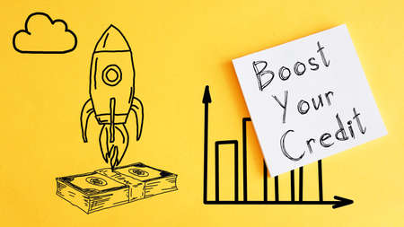 Boost your credit is shown on a photo using the textの写真素材