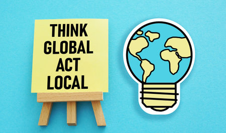 Think global act local is shown using the textの写真素材