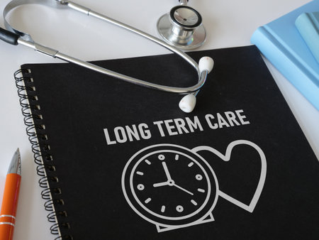 Long term care insurancel is shown using a text and photo of stethoscopeの写真素材