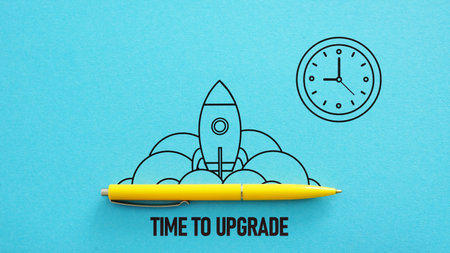 Time to upgrade is shown using a text and the picture of the clock and the rocket launchの写真素材
