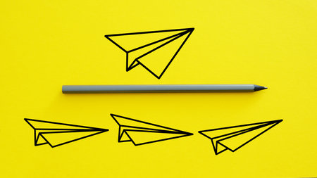 Competitive advantage is shown using a picture of paper airplanesの写真素材