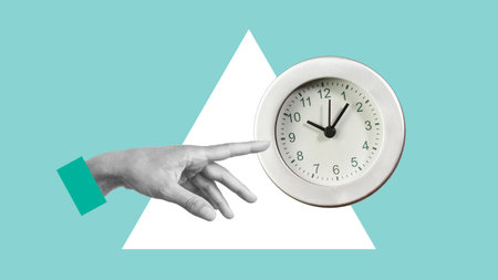 If not now when is shown using a photo of the hand pointing to the clock. Time to start conceptの写真素材