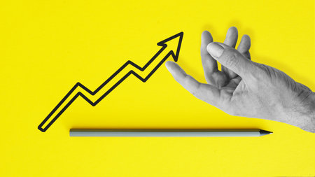 Stop loss. Businessman making a stop loss or selling stocks in the portfolio to reduce the risk of investment as a safety precaution in risky investmentsの写真素材