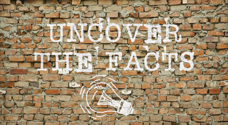 Uncover the facts is shown using the text and picture of the lamp on the wallの写真素材