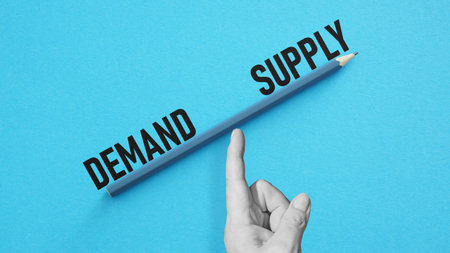 Supply and demand balance concept is shown using a textの写真素材