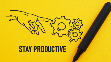 Stay productive is shown using the text and picture of hand with gearsの写真素材