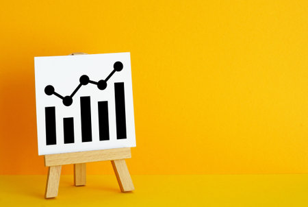 Up arrow chart on the easel. Success, growth and performance improvement. Statistics and business analytics. High efficiency and productivity. Income revenue statement analysisの写真素材