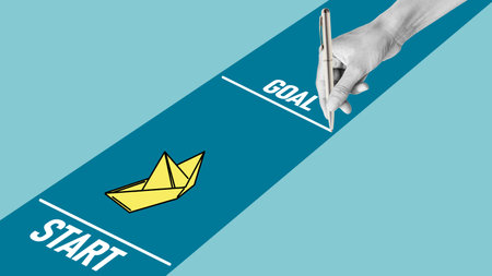 Goal setting and Goal achievement, progress in business or education concept. Paper boat floats from the start line towards goal lineの写真素材