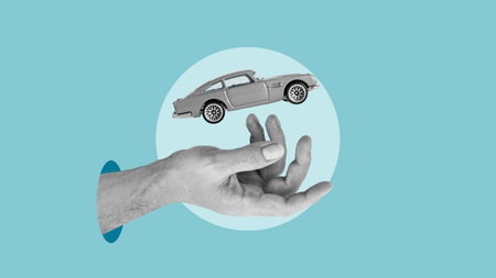 Car automobile insurance and collision damage waiver . The hand is catching the falling carの写真素材