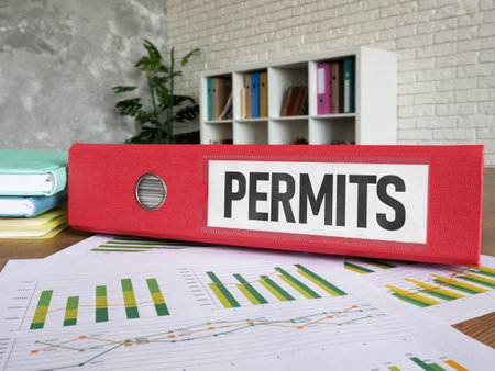 Permits are shown using the text on a red folder for papers