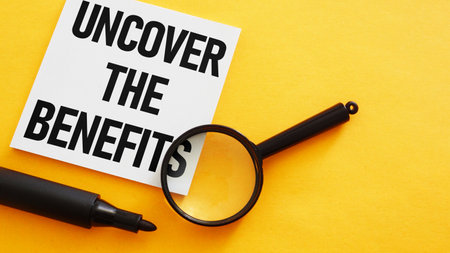 Uncover The Benefits is shown using a textの写真素材