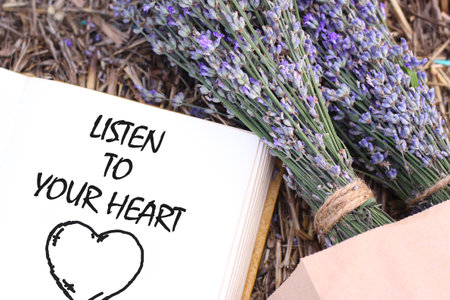 Listen to your heart is shown using the textの写真素材