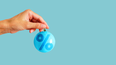 Hand reaching for discount during New Year shopping. Concept of shopping, hunting for bargains....